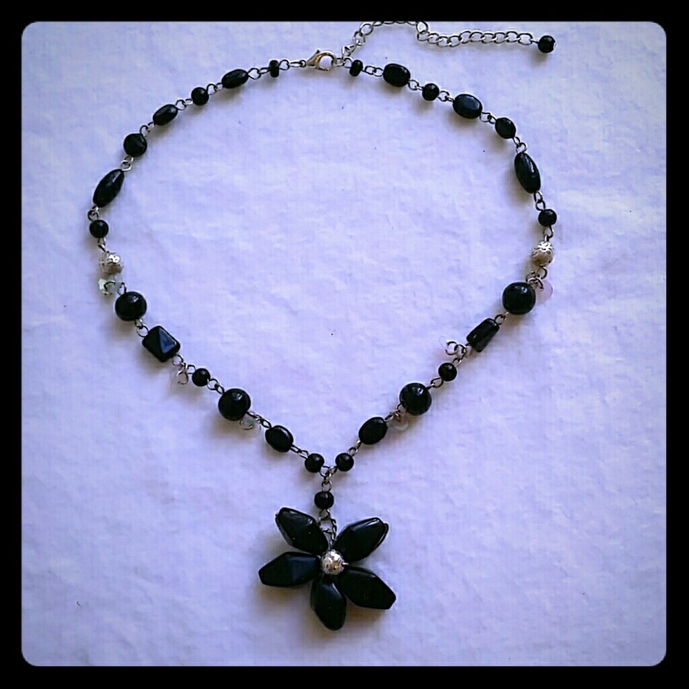 Black and silver flower necklace.